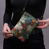 Handytasche Jan van Os „Obst und Blumen in einer Terrakotta-Vase